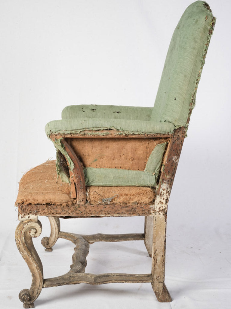 Sea-green worn fabric armchair