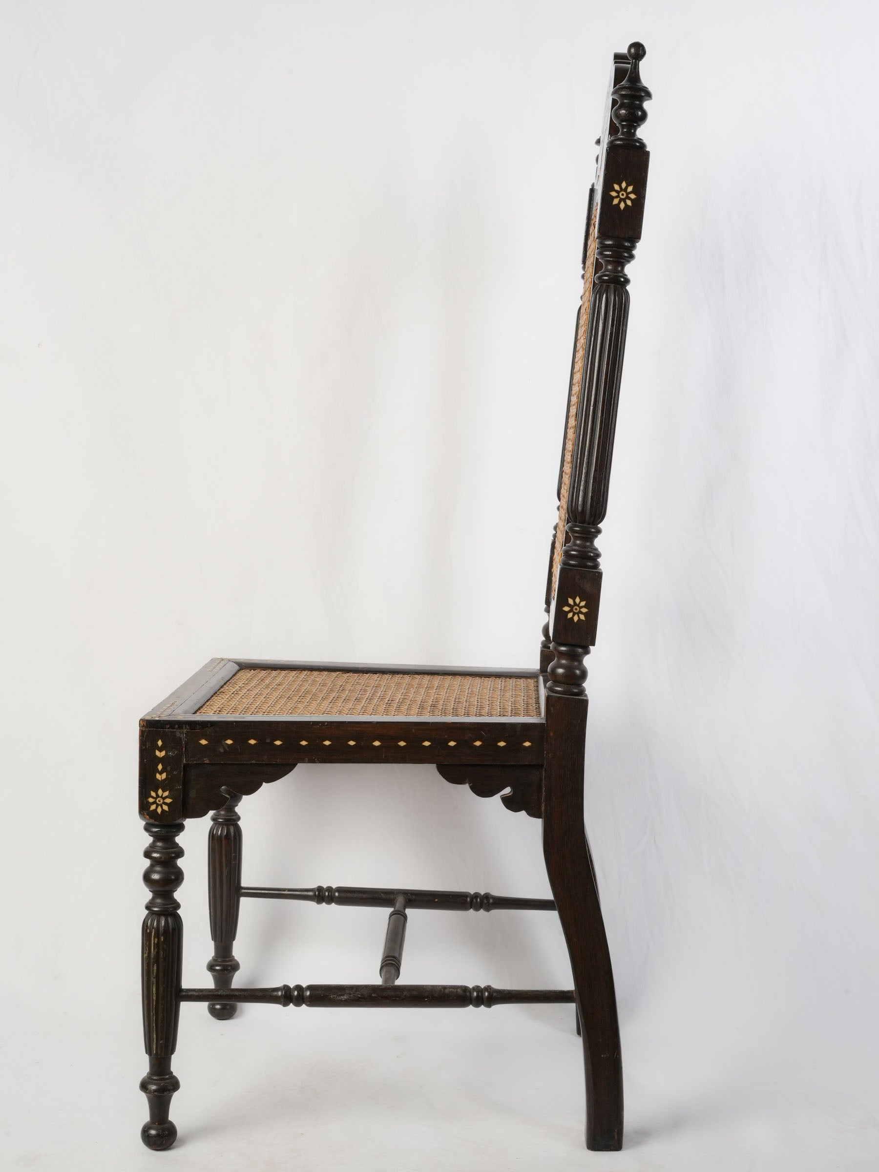 Set of Six Indo-Portuguese Ebonized Wood and Inlaid Cane Chairs, circa 1900