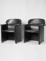 Rare 1980s black leather armchairs