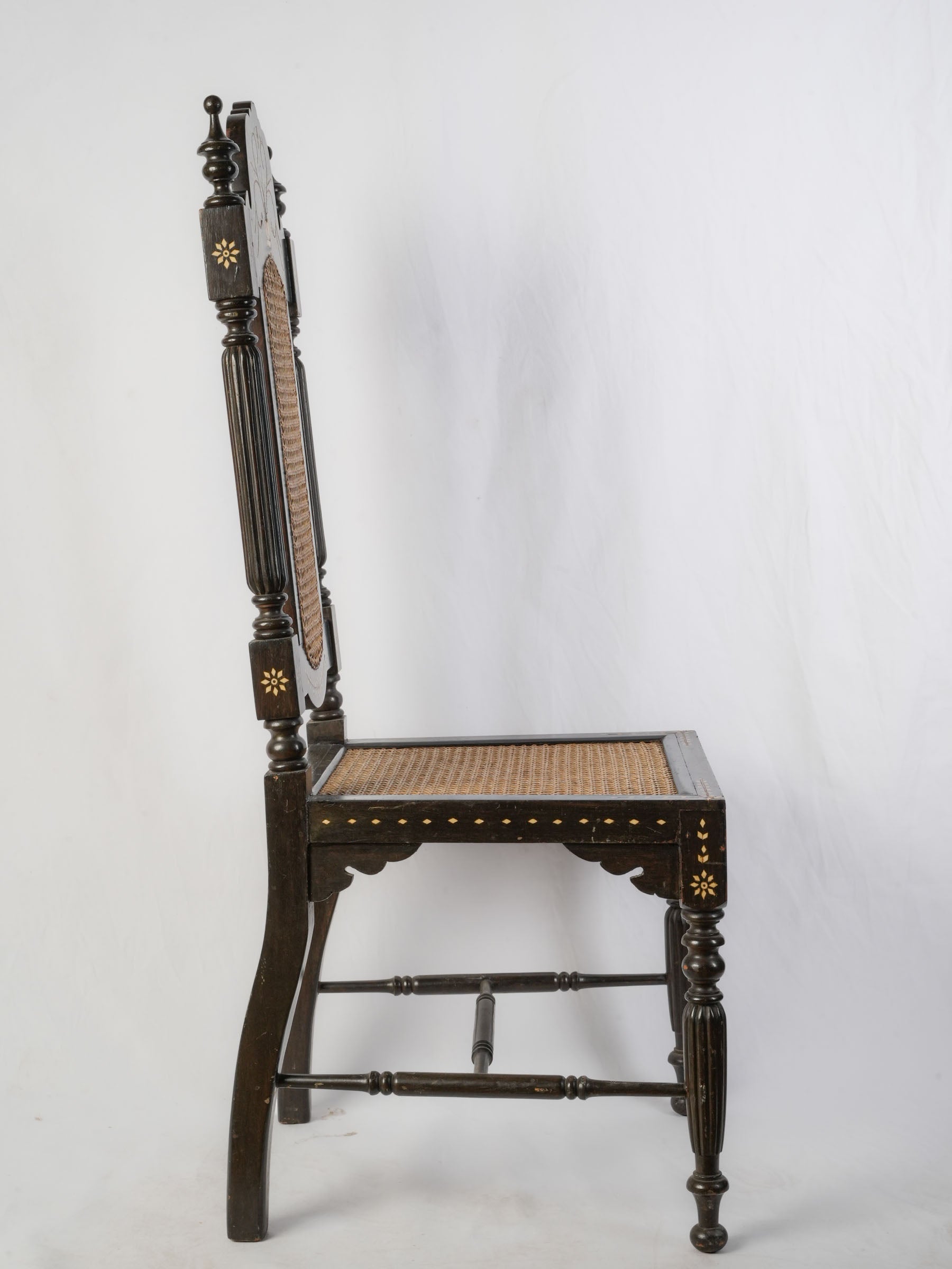 Set of Six Indo-Portuguese Ebonized Wood and Inlaid Cane Chairs, circa 1900