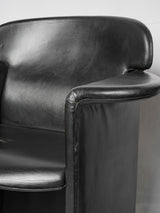 Classic leather armchairs on rollers