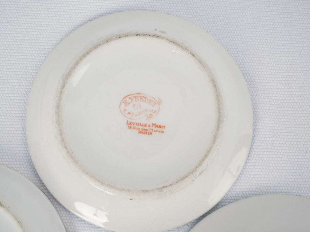 Quaint aged bistro currency saucers