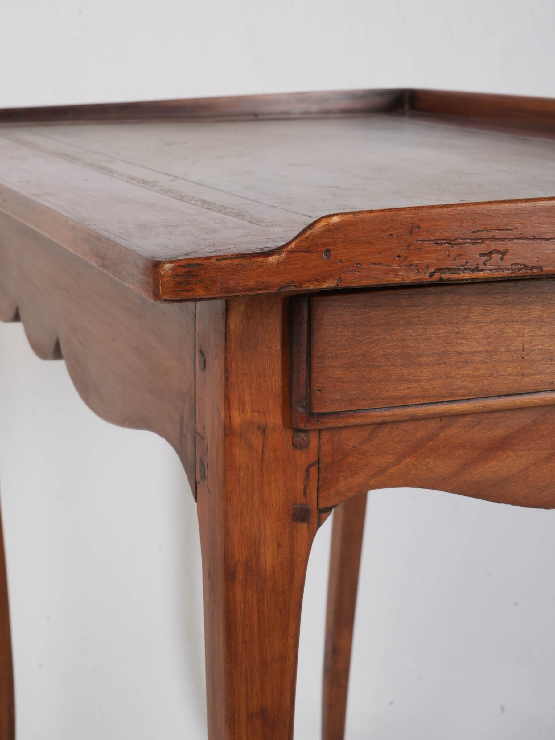 Scalloped apron antique cherrywood table  