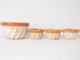 Collection of 4 vintage ceramic Bundt cake molds