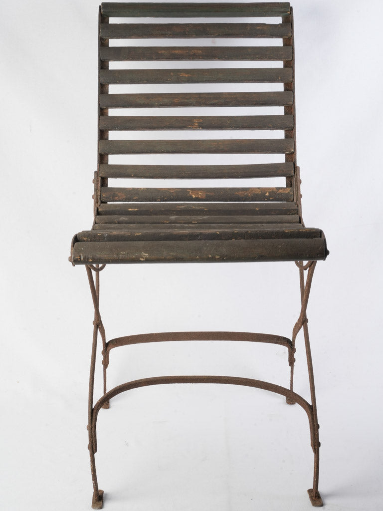 Distressed wooden slat garden chair