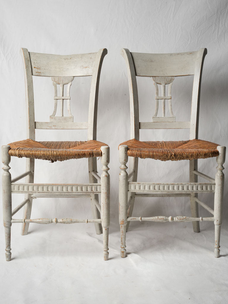 Worn rush straw seats  