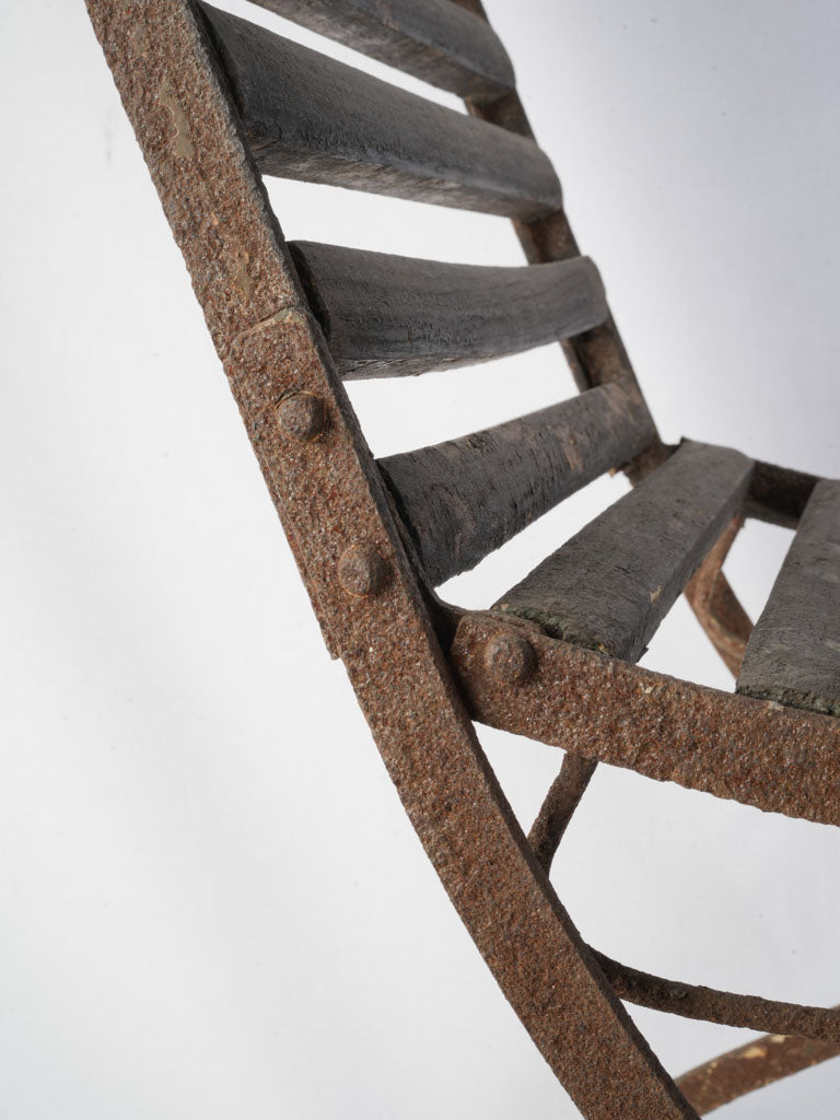 Weathered wrought-iron dining chair