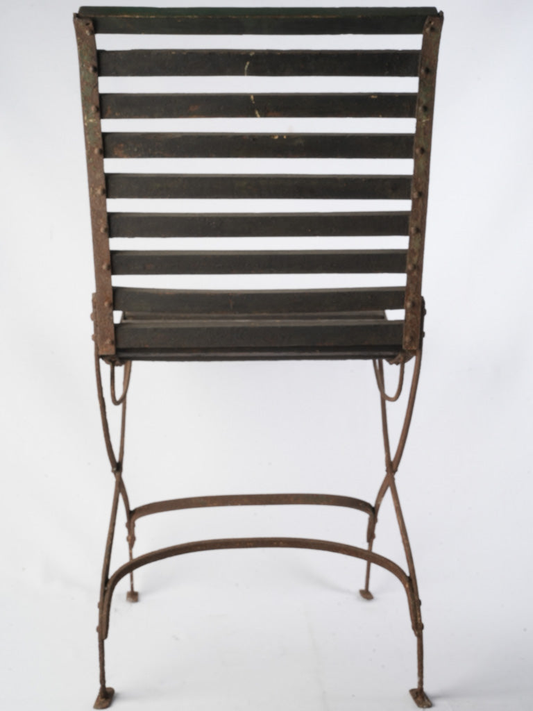 Patinated iron outdoor furniture