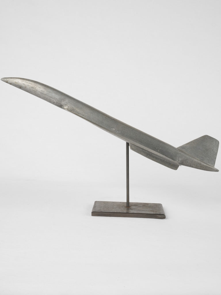 Sleek silver-toned airplane model