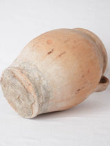 Classic earth-toned pottery confit pot