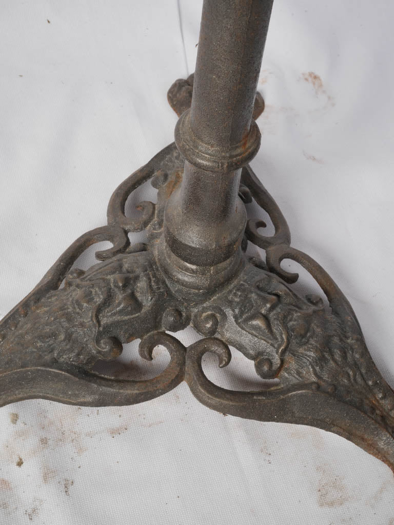 Tarnished brass rimmed bistro table