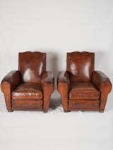 Traditional square-footed French club chairs