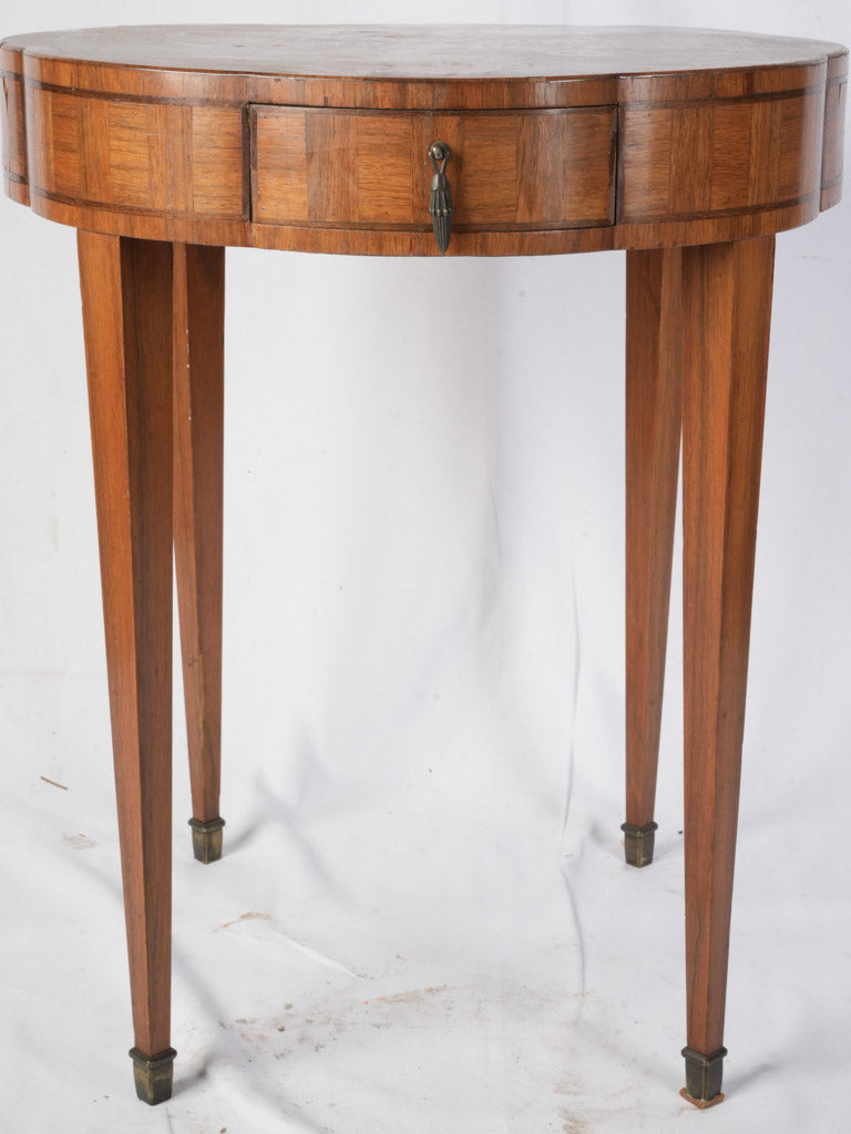 Symmetrical neoclassical style side table  