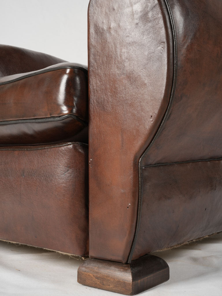 Distinctive 1930s moustache leather chair