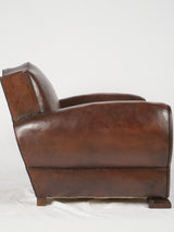 Luxurious dark leather antique armchair