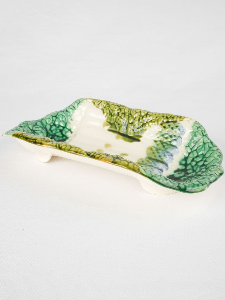 Antique green majolica asparagus cradle