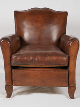 Vintage moustache-back leather armchair