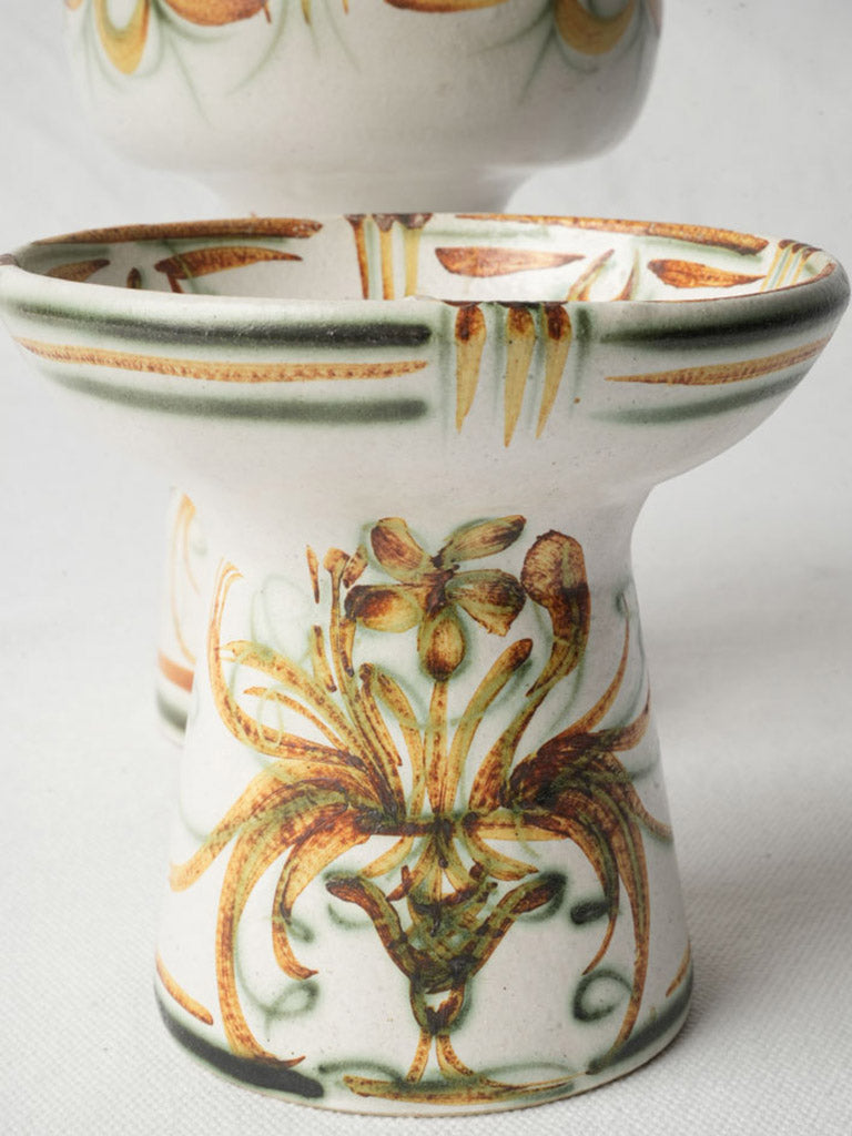 Graduated height pottery candlesticks