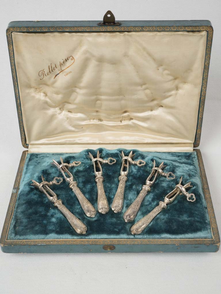 Ornate vintage dinner serving handles