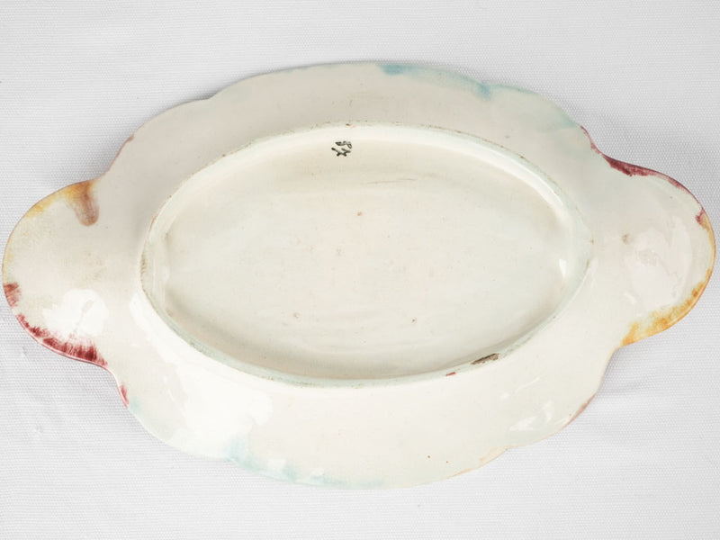 Colorful early-century French Barbotine plate