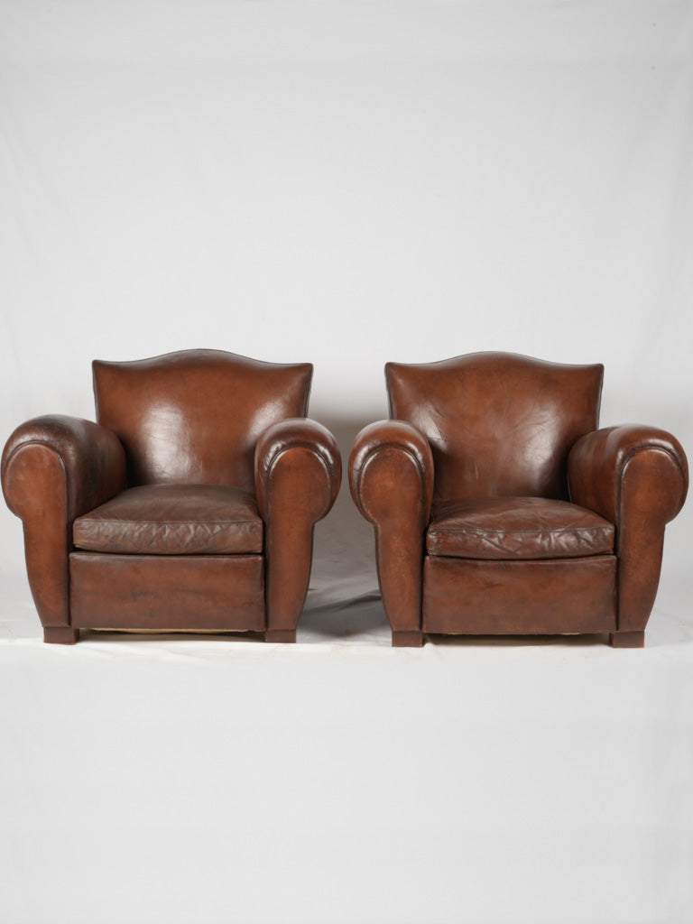 Restored vintage leather armchairs