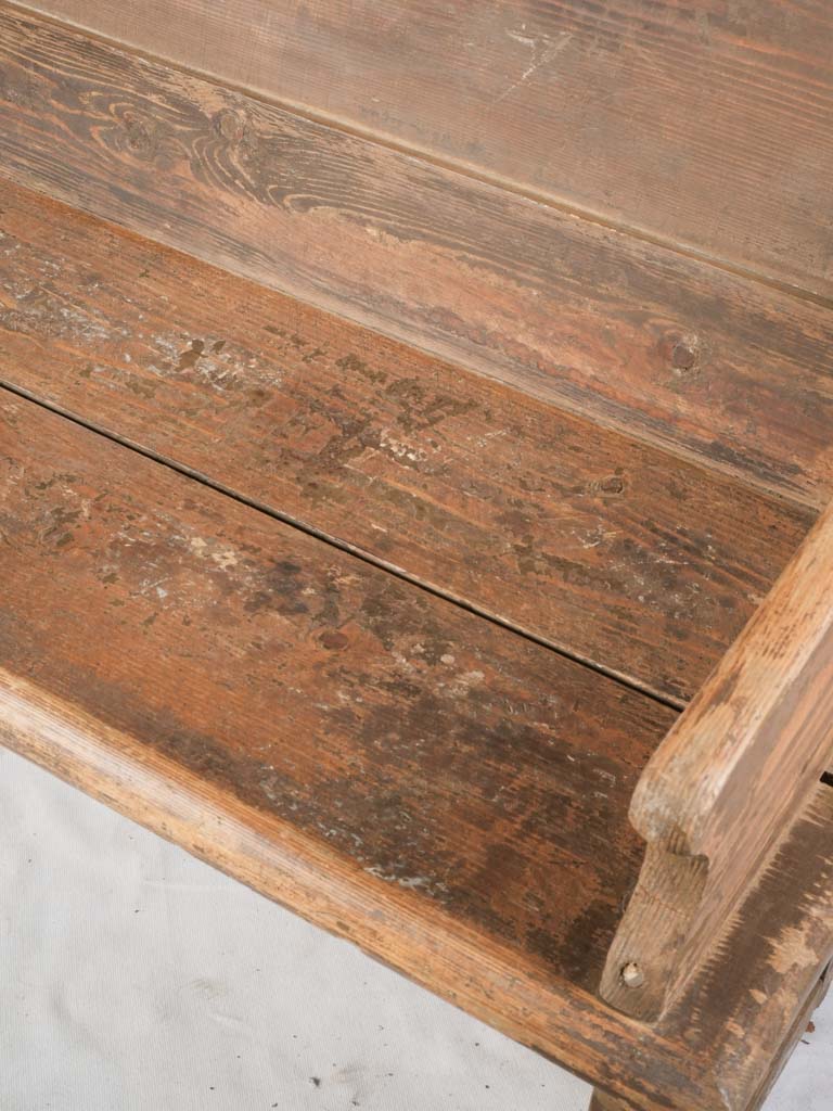 Chestnut-brown solid pine pew