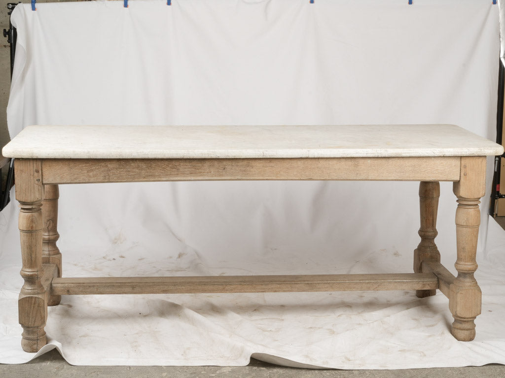Understated elegance in French oak console