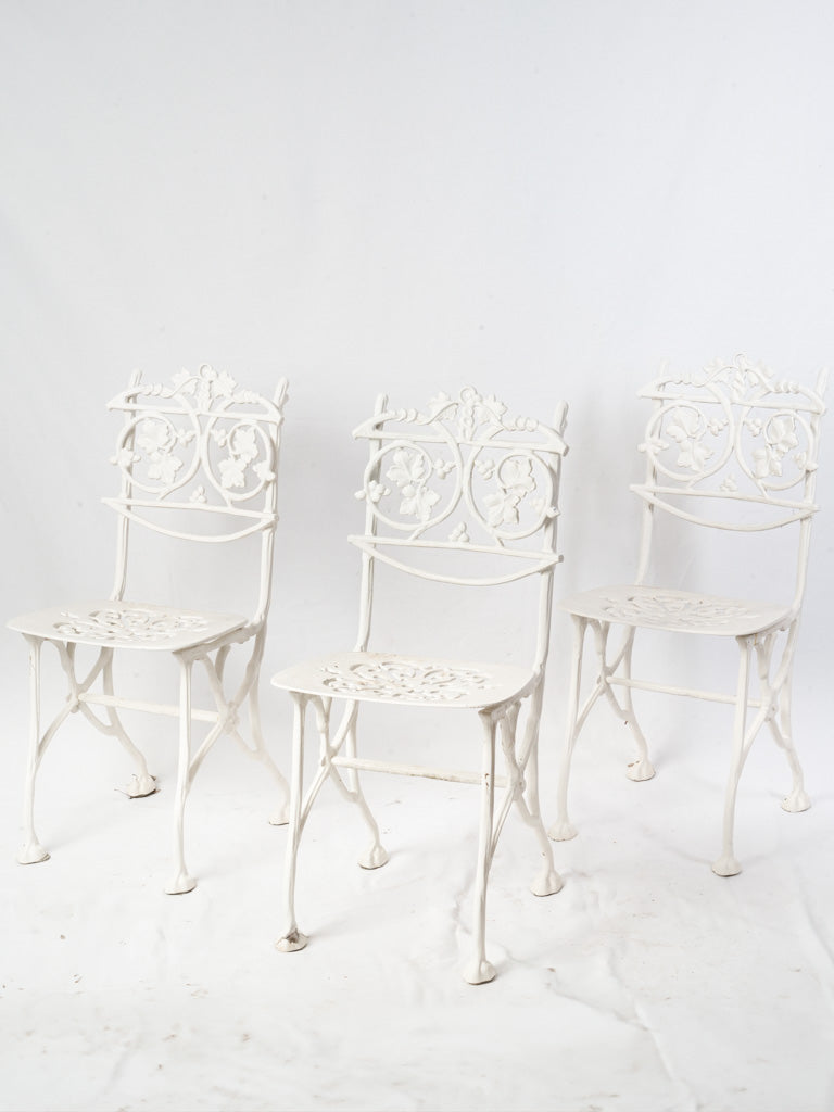 Set of Three Mid-20th Century French White Painted Cast Aluminum Garden Chairs w/ Decorative Foliate Backs - 35½"