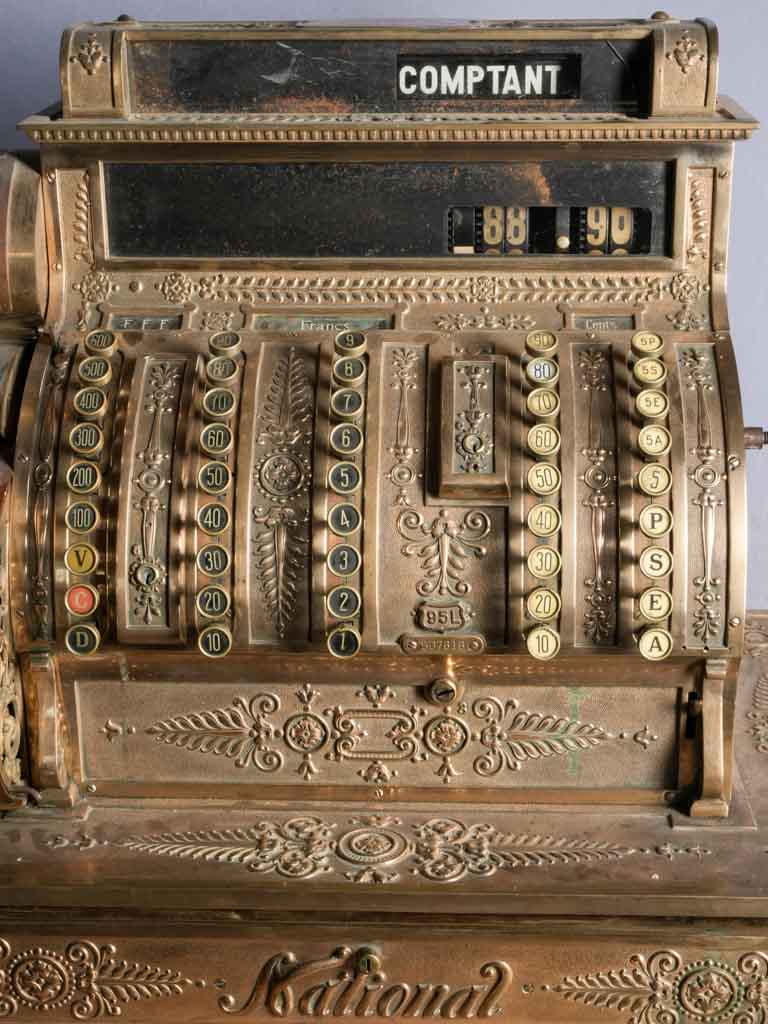 Intricate foliate cash register