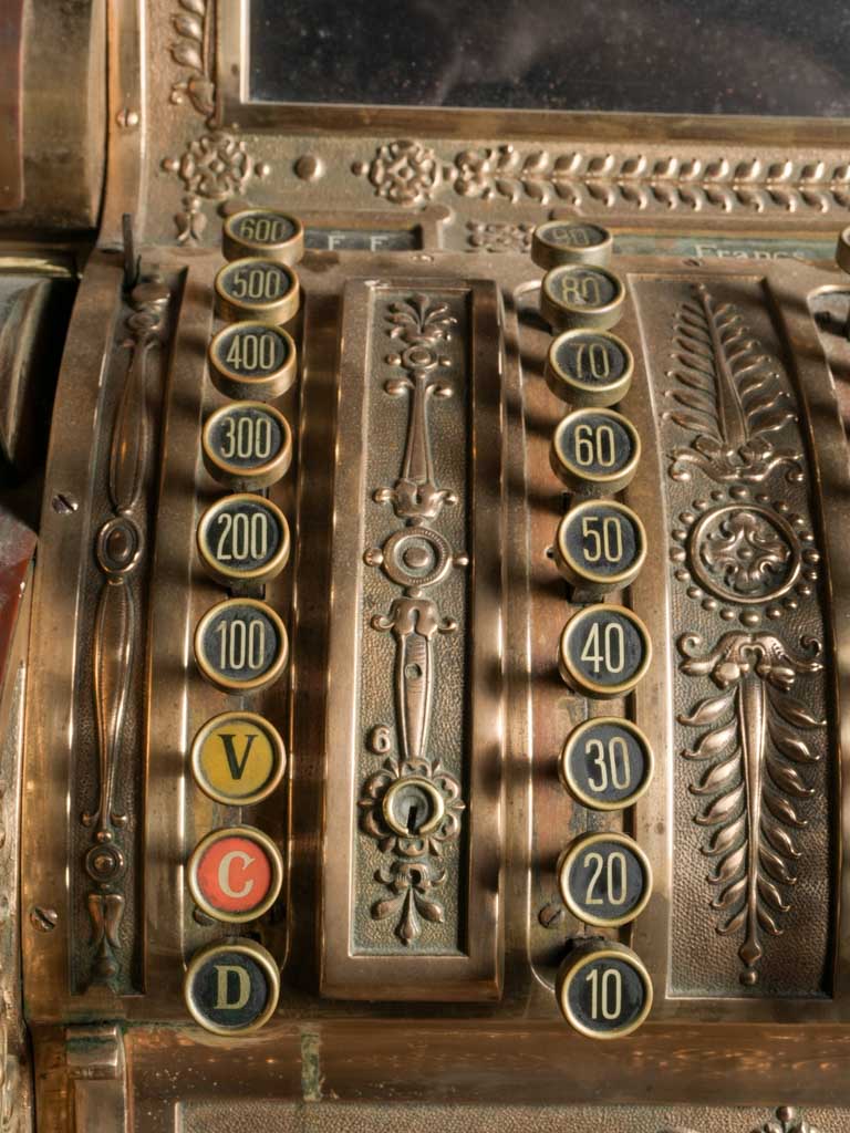 Patina-rich brass cash register