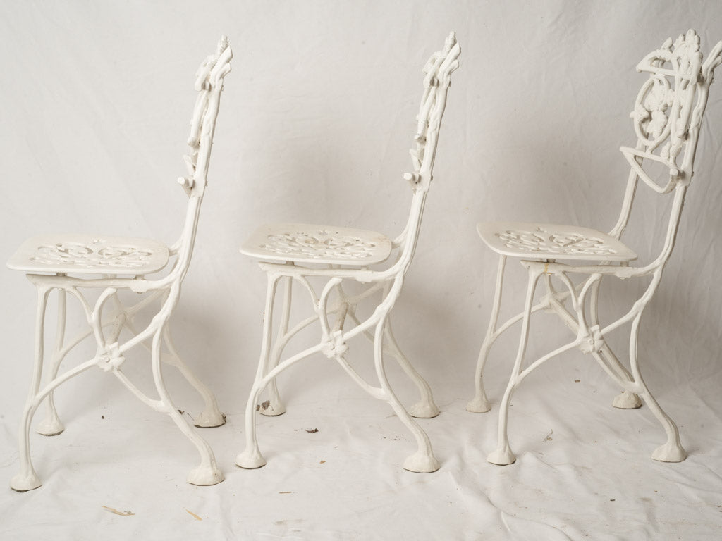 3 Vintage French White Painted Cast Aluminum Garden Chairs w/ Decorative Foliate Backs