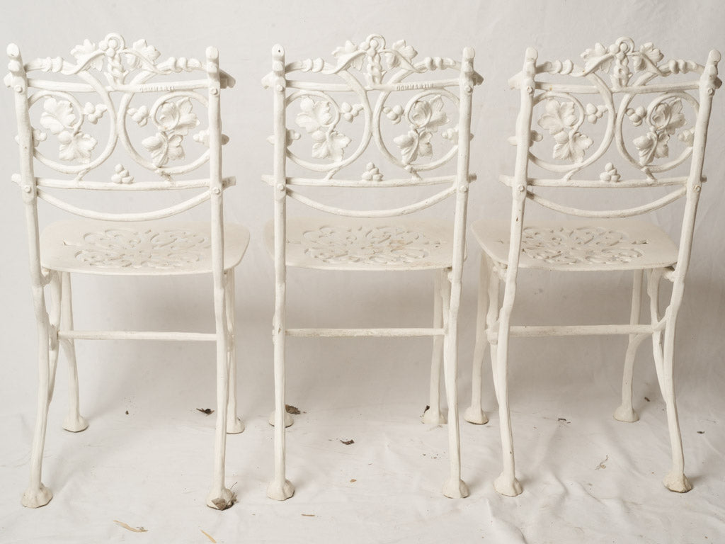 3 Vintage French White Painted Cast Aluminum Garden Chairs w/ Decorative Foliate Backs