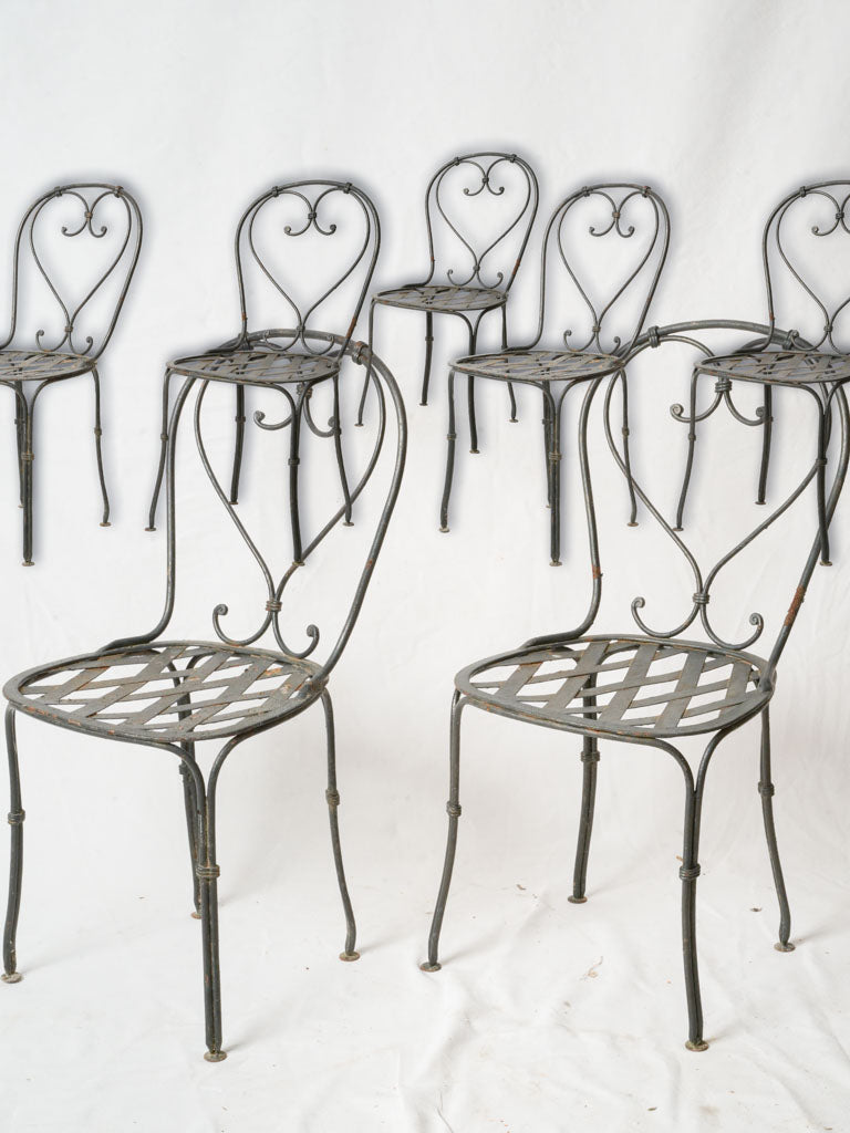 Set of Seven French Wrought Iron Garden Chairs Circa 1960s W/ Heart Backs