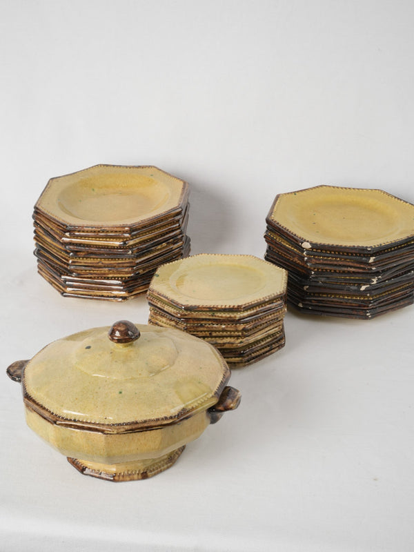 Set of antique French plates, tureen, and serving dishes w/ yellow glaze