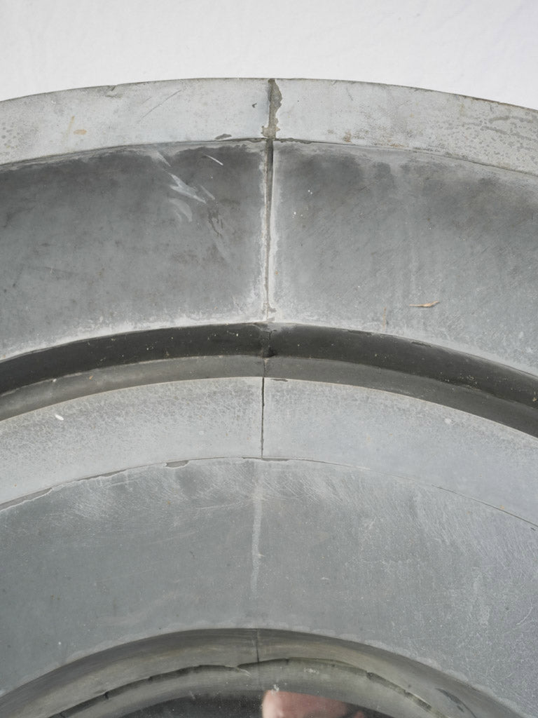 Timeworn grand-scale mirror  