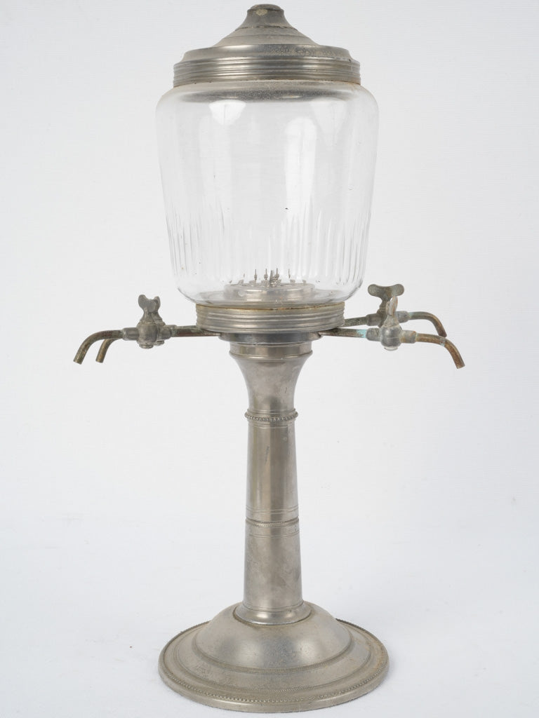Intricate antique absinthe dispensing fountain