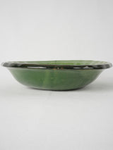 Time-worn oval green serving dish