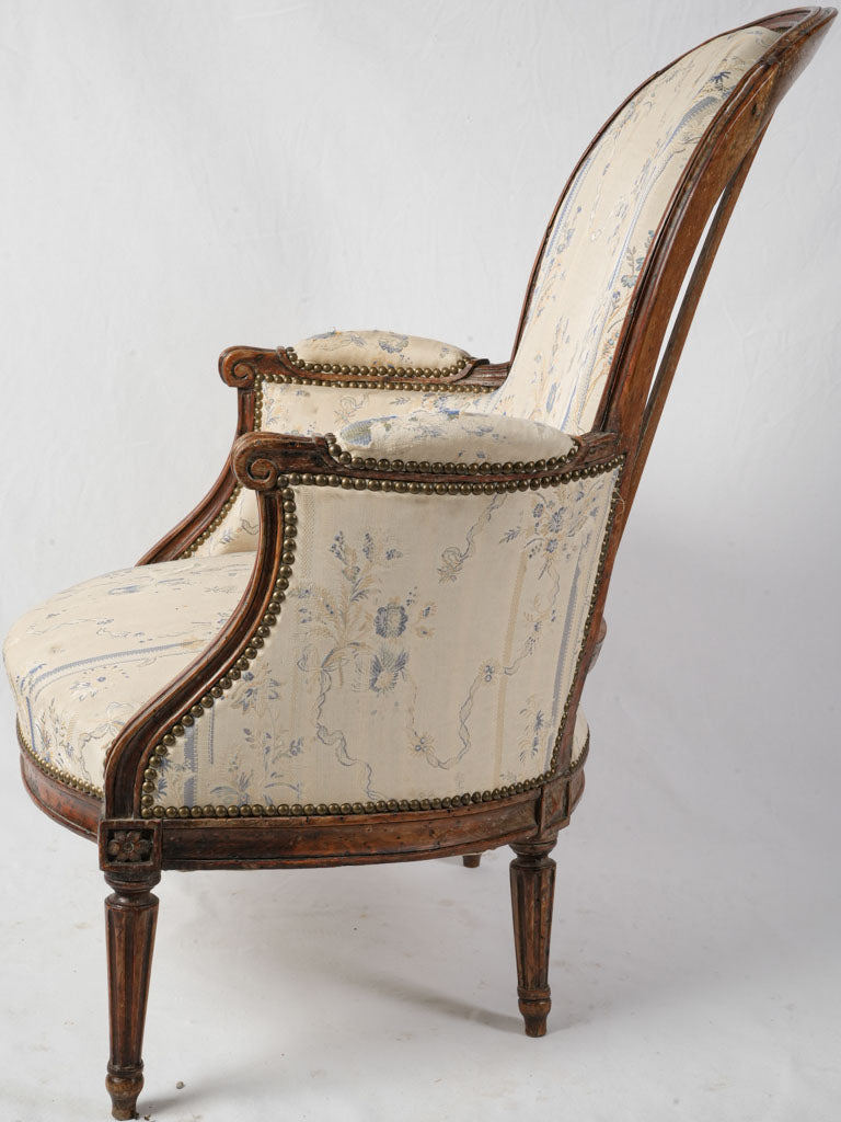 Distinguished walnut Bergere armchair  