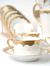 Meticulously crafted gold-trimmed saucers