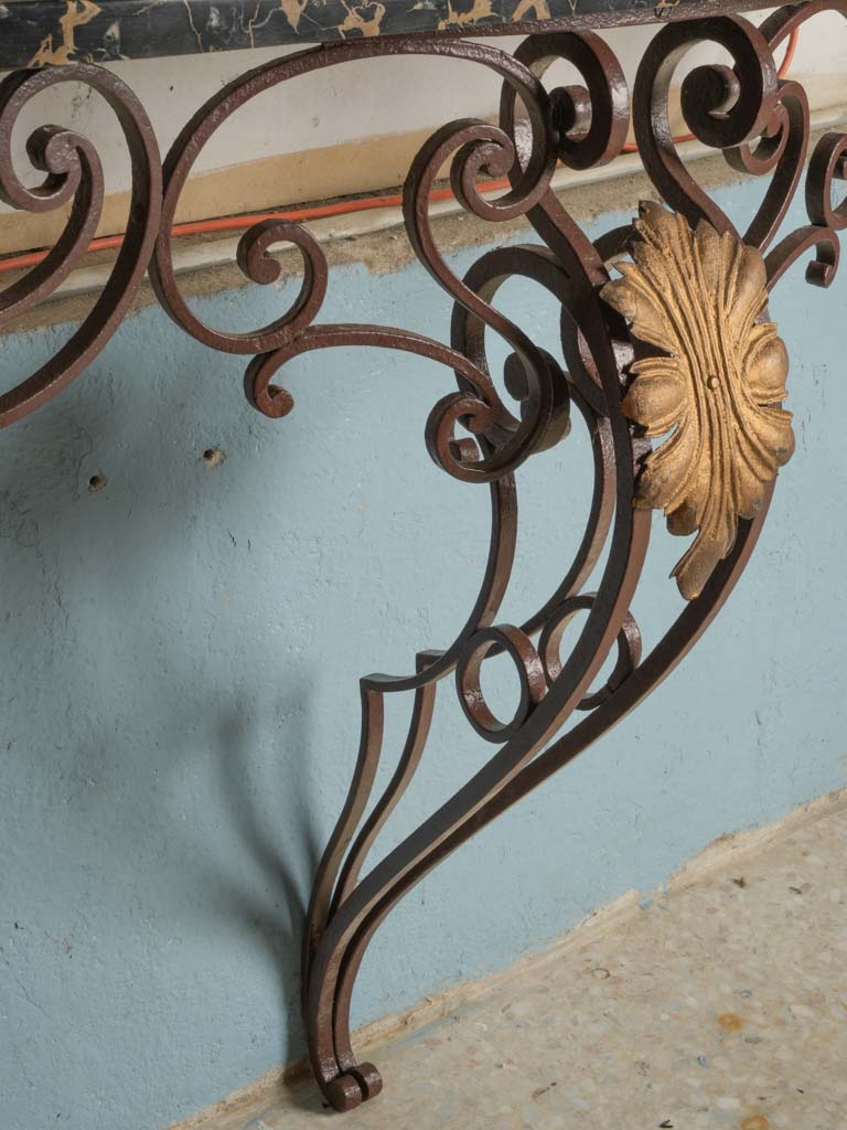 Warm patina iron consoles