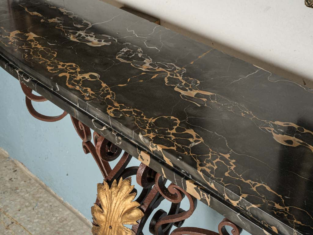 Intricate ferronnerie French consoles