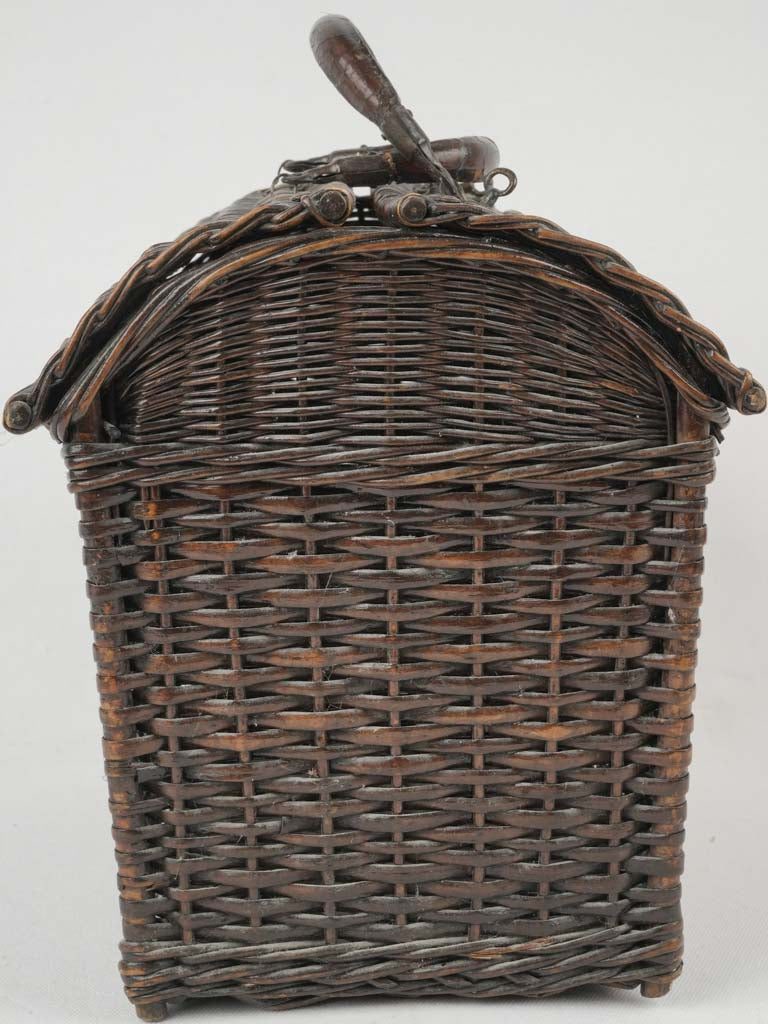 Time-worn black wicker egg basket