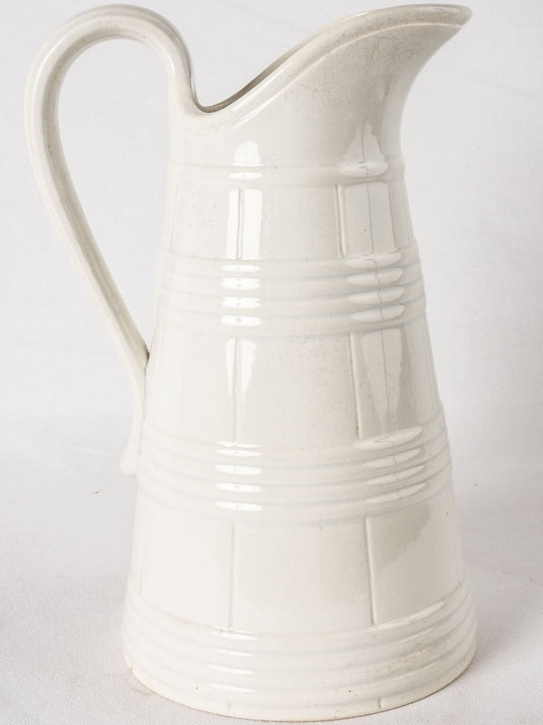 Large white Sarreguemines water pitcher - wine barrel motif 15"