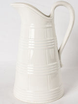 Large white Sarreguemines water pitcher - wine barrel motif 15"