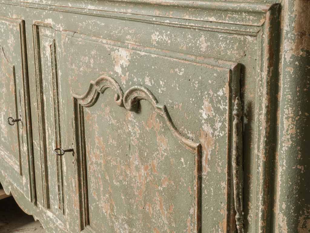 Subtle curves antique French buffet