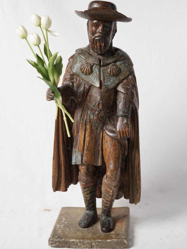 Antique wooden pilgrim statue  