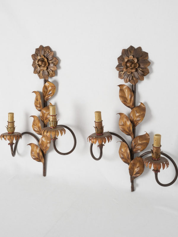 Pair of vintage two-light wall sconces w/ floral motifs