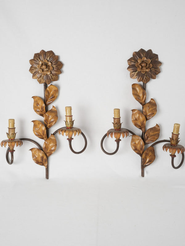 Pair of vintage two-light wall sconces w/ floral motifs