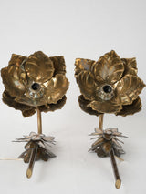 Decorative brass sconces with flower