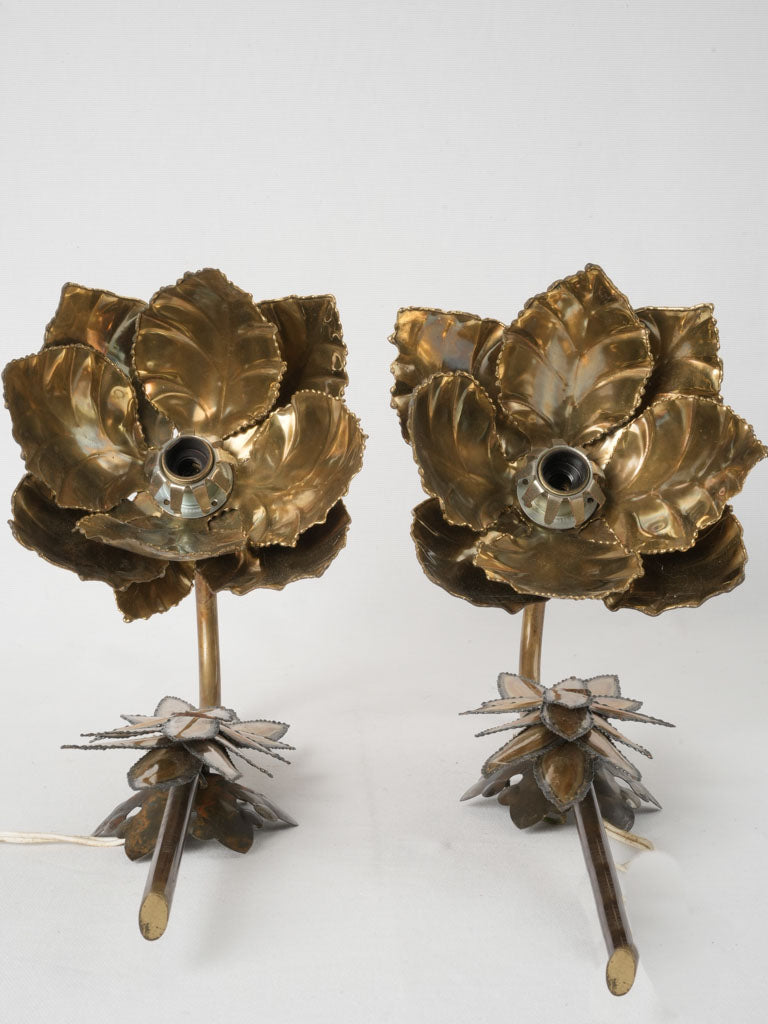 Decorative brass sconces with flower